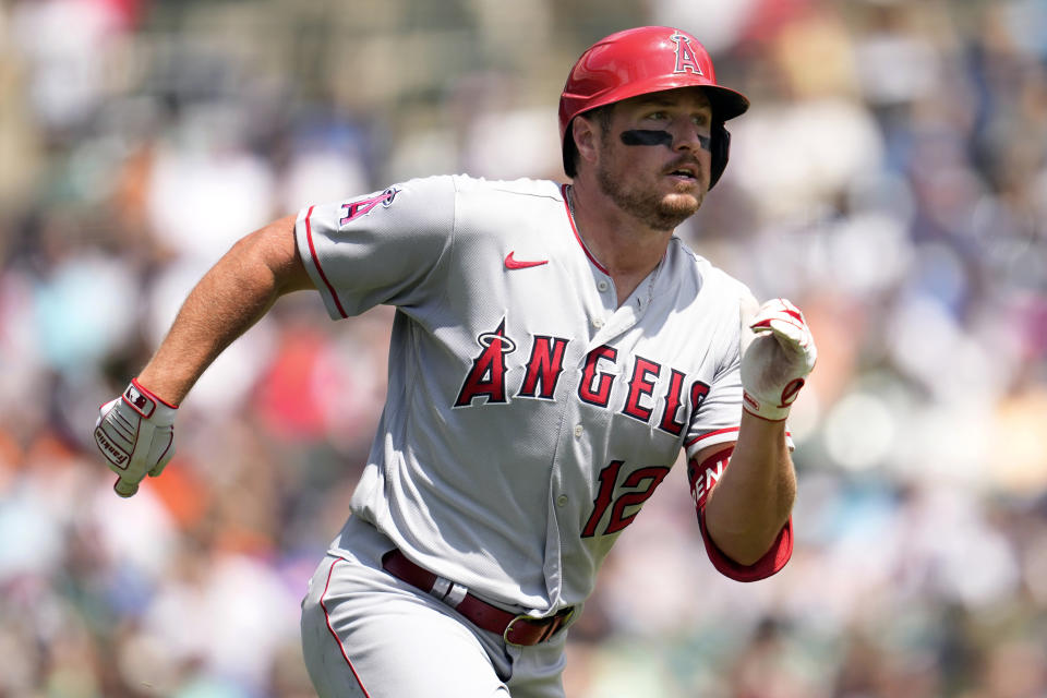 FILE - Los Angeles Angels' Hunter Renfroe runs out a double against the Detroit Tigers in the fourth inning during the first baseball game of a doubleheader, Thursday, July 27, 2023, in Detroit. The Kansas City Royals made a pair of free-agent moves Friday, agreeing to a $32 million, two-year contract with pitcher Michael Wacha and a a $13 million, two-year deal with outfielder Hunter Renfroe. people familiar with the negotiations told The Associated Press. The people spoke on condition of anonymity Friday, Dec. 15, 2023, because the agreements had not been announced. (AP Photo/Paul Sancya, File)