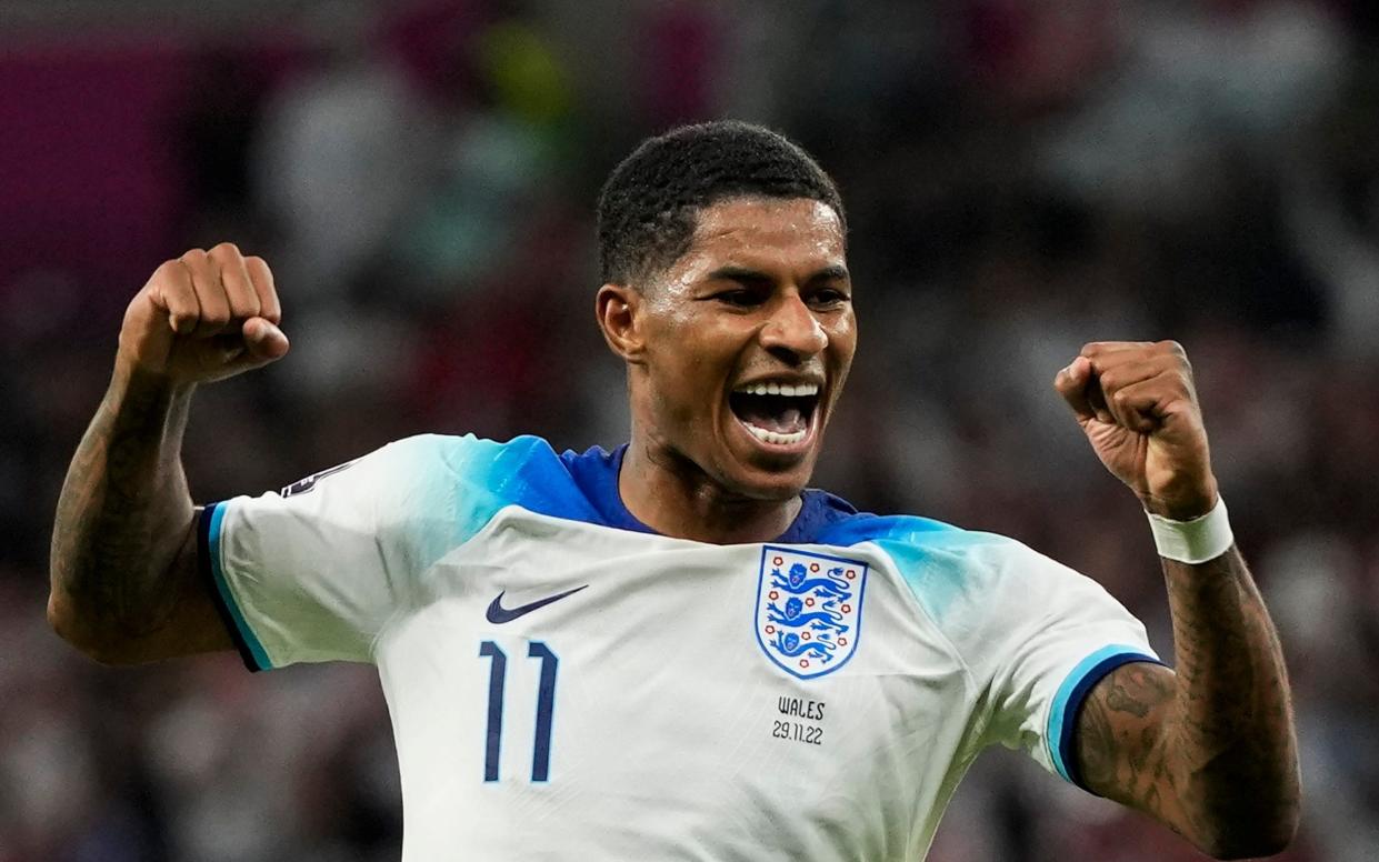 England's Marcus Rashford celebrates after scoring his side's third goal during the World Cup group B soccer match between England and Wales - World Cup 2022 TV schedule: How to watch England and the next matches - Frank Augstein/AP