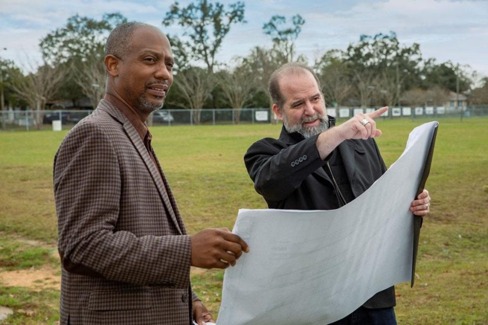 Escambia County Commissioner and SYSA co-founder Lumon May, left, and Troy Rafferty review plans for the Rafferty Center, a $2.7 million project being built alongside the Theophalis May Community Center, thanks to the Rafferty couple's $1 million donation.