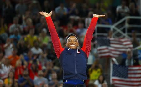 2016 Rio Olympics - Artistic Gymnastics - Final - Women's Floor Final - Rio Olympic Arena - Rio de Janeiro, Brazil - 16/08/2016. Gold medalist Simone Biles (USA) of USA reacts. REUTERS/Mike Blake