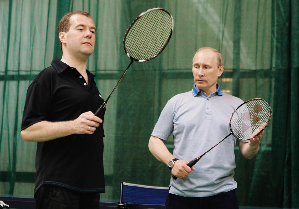 Putin plays badminton with Medvedev in the Gorky House outside Moscow on June 11, 2011.