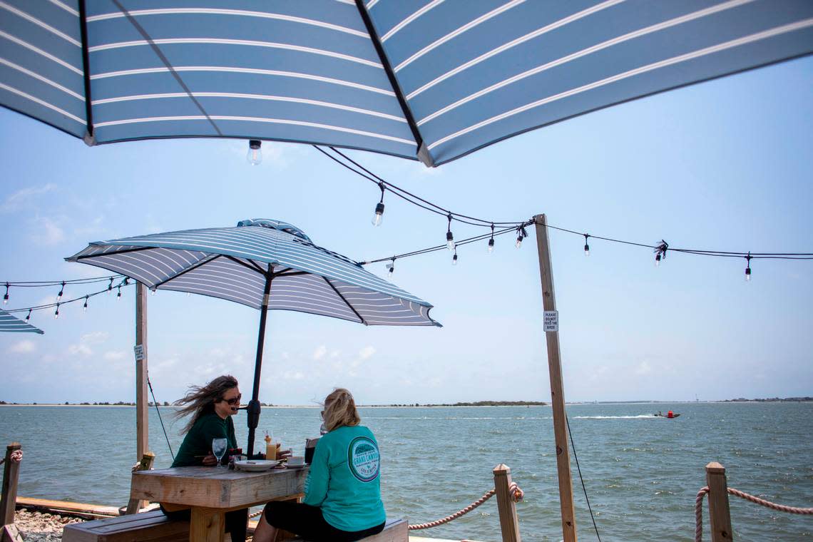 Patrons enjoy afternoon outdoor dining in Beaufort in June 2022.