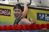 Lilly King of the United States celebrates after the Women 200m Breaststroke final at the 19th FINA World Championships in Budapest, Hungary, Thursday, June 23, 2022. (AP Photo/Anna Szilagyi)