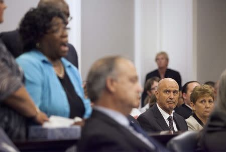 The parents of Michael Slager look on during an emotional plea from Judy Scott (L), mother of Walter Scott, to deny bond for former police officer Slager, in Charleston, South Carolina, in this September 10, 2015, file photo. REUTERS/Randall Hill/Files