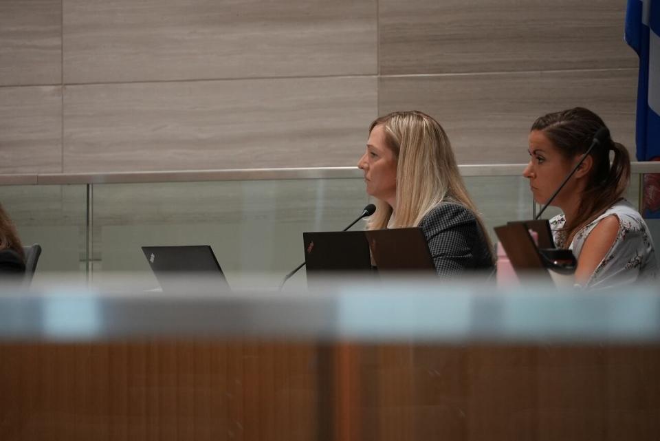  Executive director of operations Shawna Boakes answers questions during a city council meeting. 