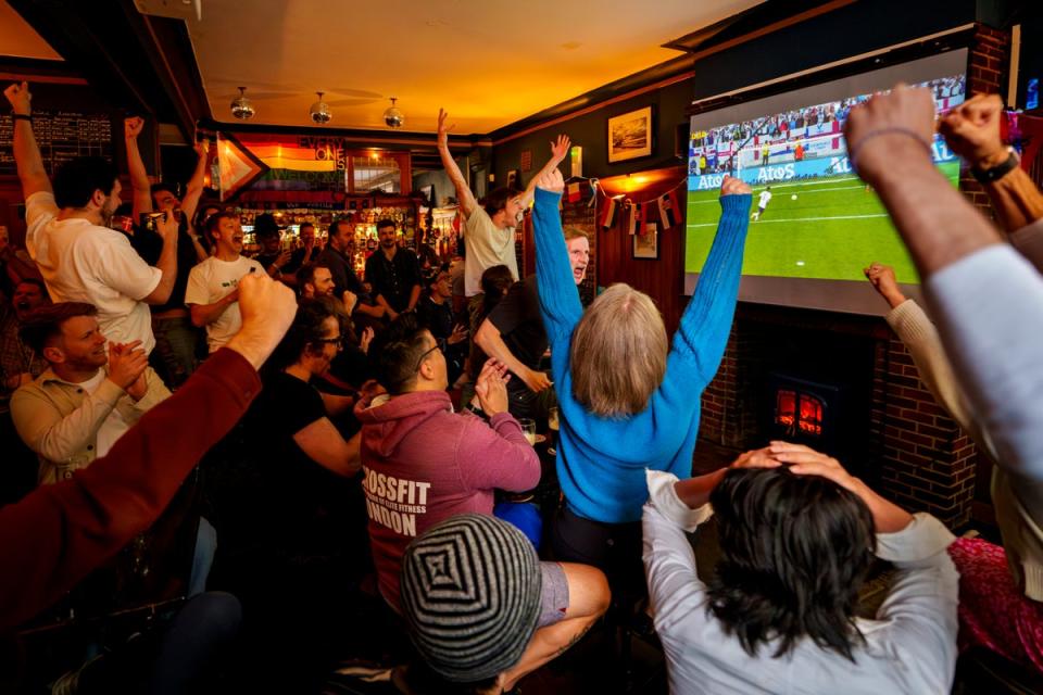 There is hope there will be more cheer in pubs across England on Sunday evening (AP)