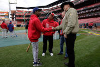 ST LOUIS, MO - OCTOBER 20: Manager Ron Washington of the Texas Rangers meets country star Trace Atkins prior to Game Two of the MLB World Series against the St. Louis Cardinals at Busch Stadium on October 20, 2011 in St Louis, Missouri. (Photo by Jamie Squire/Getty Images)