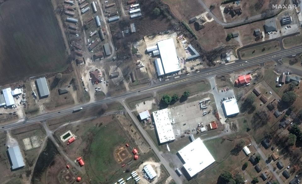 This satellite image provided by Maxar Technologies shows businesses and homes near Blues Highway in Rolling Fork on Dec. 27, 2022 before a tornado struck overnight on Friday.