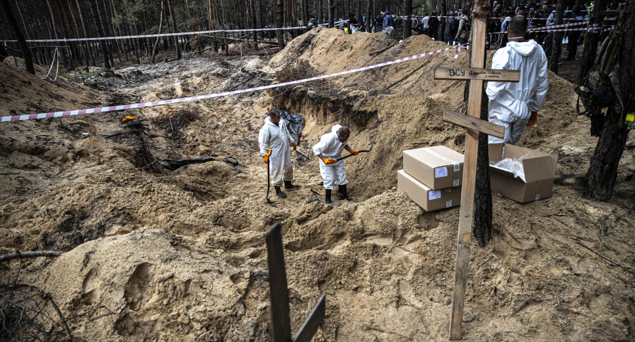 Ukrainian authorities exhume bodies of hundreds of people in Izyum, Ukraine.