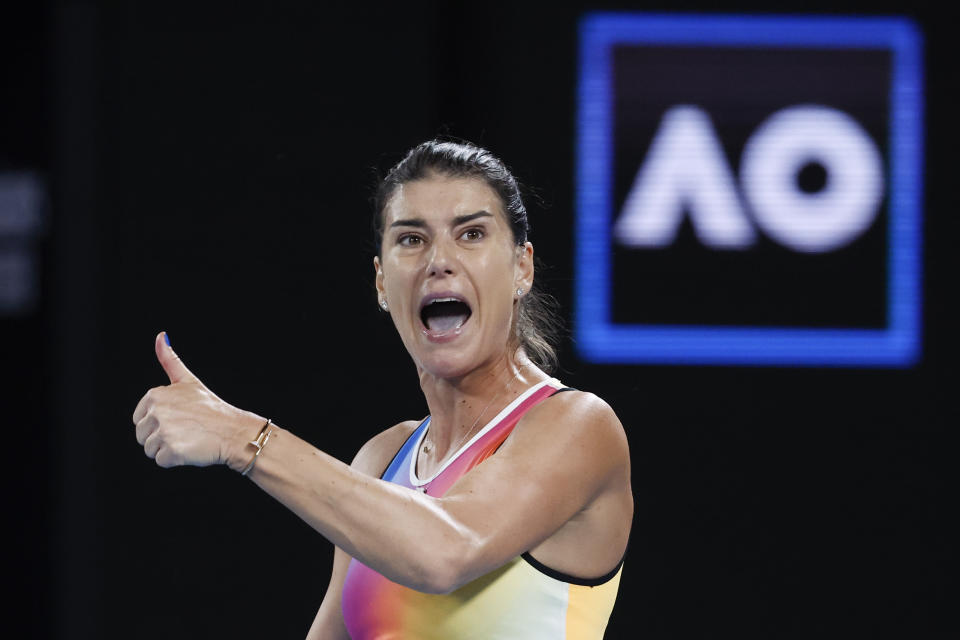 Sorana Cirstea of Romania reacts during her third round match against Anastasia Pavlyuchenkova of Russia at the Australian Open tennis championships in Melbourne, Australia, Saturday, Jan. 22, 2022. (AP Photo/Hamish Blair)