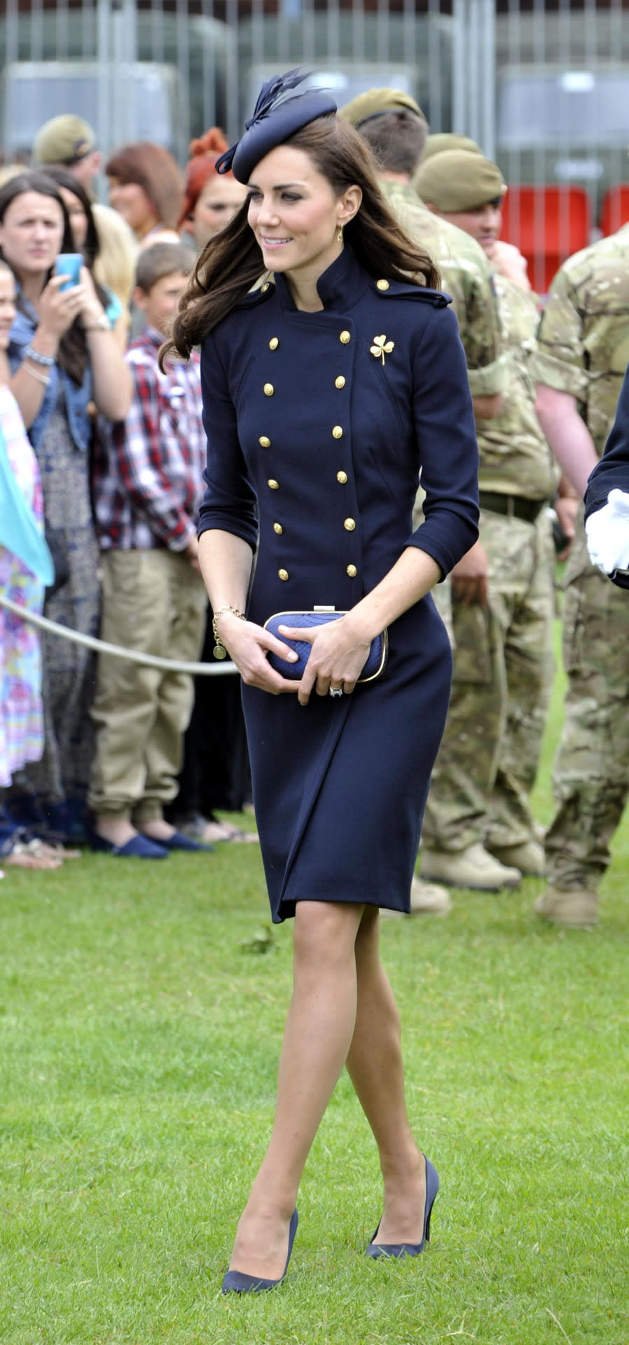 <p>For a military service, Kate donned a navy Alexander McQueen coat with a matching hat and Anya Hindmarch box clutch. </p><p><i>[Photo: PA]</i></p>