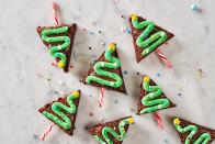 <p>These adorable Christmas trees are perfect for when you don't have a ton of time but still want to make something cute and festive. They're easy to assemble and the kids can even help decorate! Use your favorite <a href="https://www.delish.com/cooking/a28354114/fudge-brownie-recipe/" rel="nofollow noopener" target="_blank" data-ylk="slk:brownie recipe;elm:context_link;itc:0;sec:content-canvas" class="link ">brownie recipe</a> or keep it simple and use a boxed brownie like we did here.</p><p>Get the <strong><a href="https://www.delish.com/holiday-recipes/christmas/a37774998/christmas-tree-brownies-recipe/" rel="nofollow noopener" target="_blank" data-ylk="slk:Christmas Tree Brownies recipe;elm:context_link;itc:0;sec:content-canvas" class="link ">Christmas Tree Brownies recipe</a></strong>.</p>