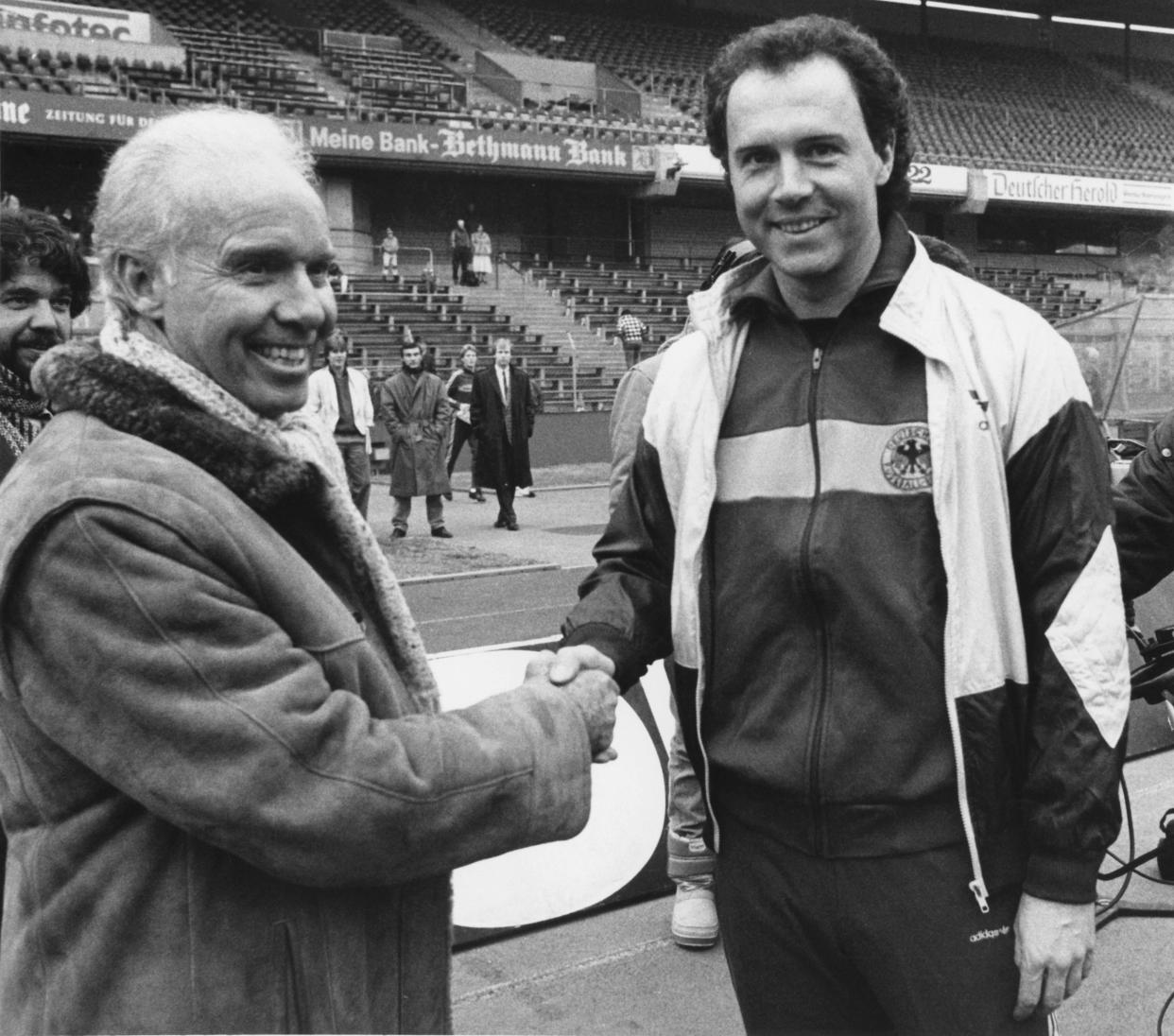 Mário Zagallo and Franz Beckenbauer shake hands ahead of a Brazil-Germany match in 1986. (Eilmes/Picture Alliance via Getty Images)