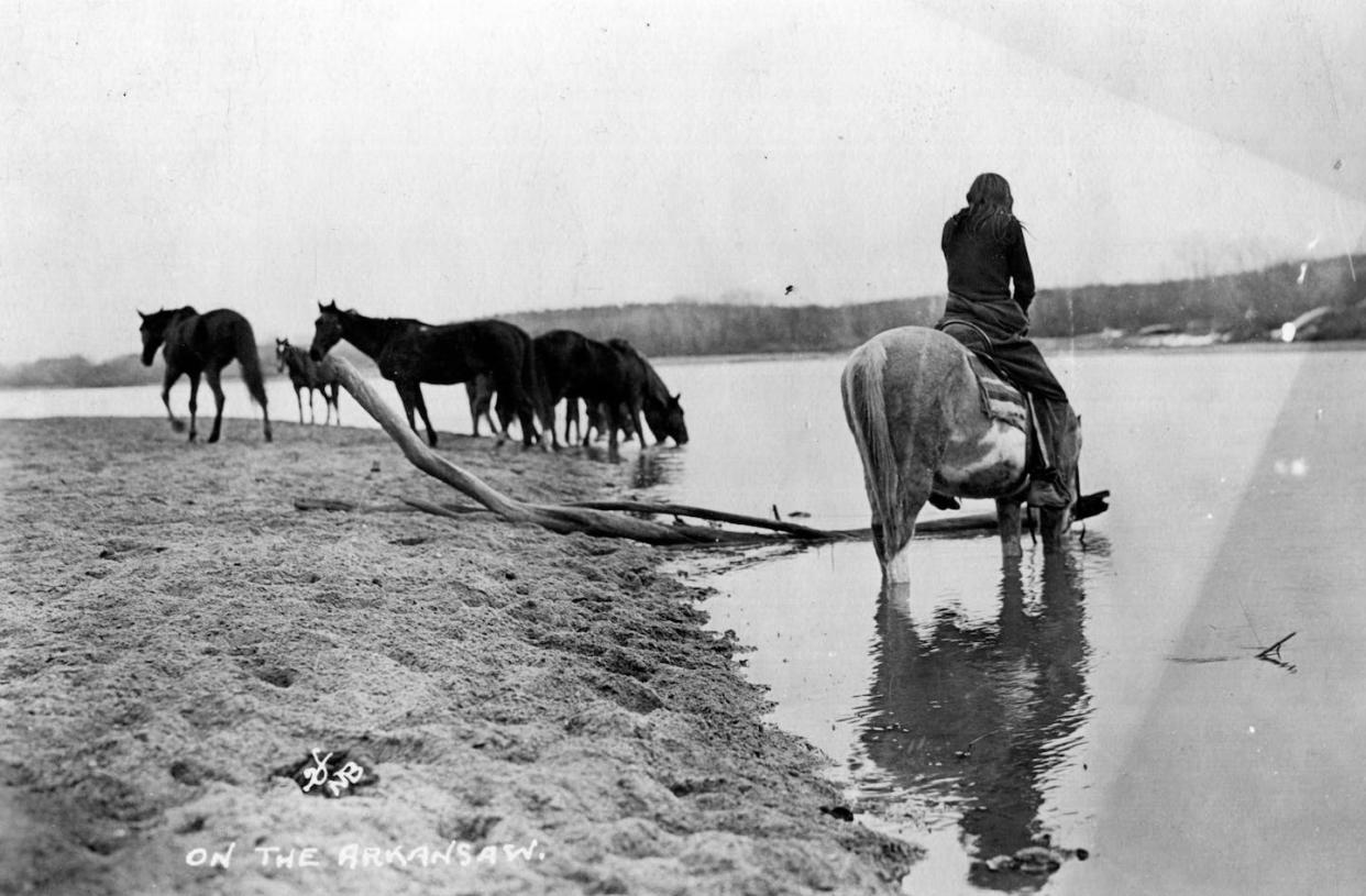 An Osage man on the Arkansas River sometime between 1910 and 1918 – about a decade before the Osage Reign of Terror. <a href="https://www.gettyimages.com/detail/news-photo/photograph-of-an-osage-man-on-the-arkansas-river-between-news-photo/956086514?adppopup=true" rel="nofollow noopener" target="_blank" data-ylk="slk:Vince Dillion/Oklahoma Historical Society via Getty Images;elm:context_link;itc:0;sec:content-canvas" class="link ">Vince Dillion/Oklahoma Historical Society via Getty Images</a>