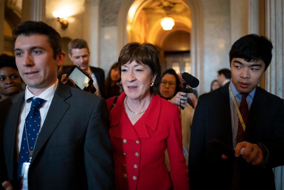 Sen. Susan Collins, R-Maine, center, departs as Republican senators leave a closed-door strategy session at the U.S. Capitol in Washington on Tuesday.