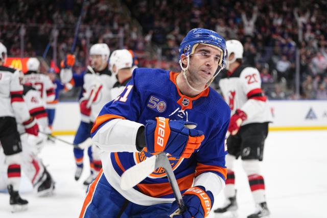 New York Islanders' Kyle Palmieri (21) reacts after scoring a goal during the second period of an NHL hockey game against the New Jersey Devils Monday, March 27, 2023, in Elmont, N.Y. (AP Photo/Frank Franklin II)
