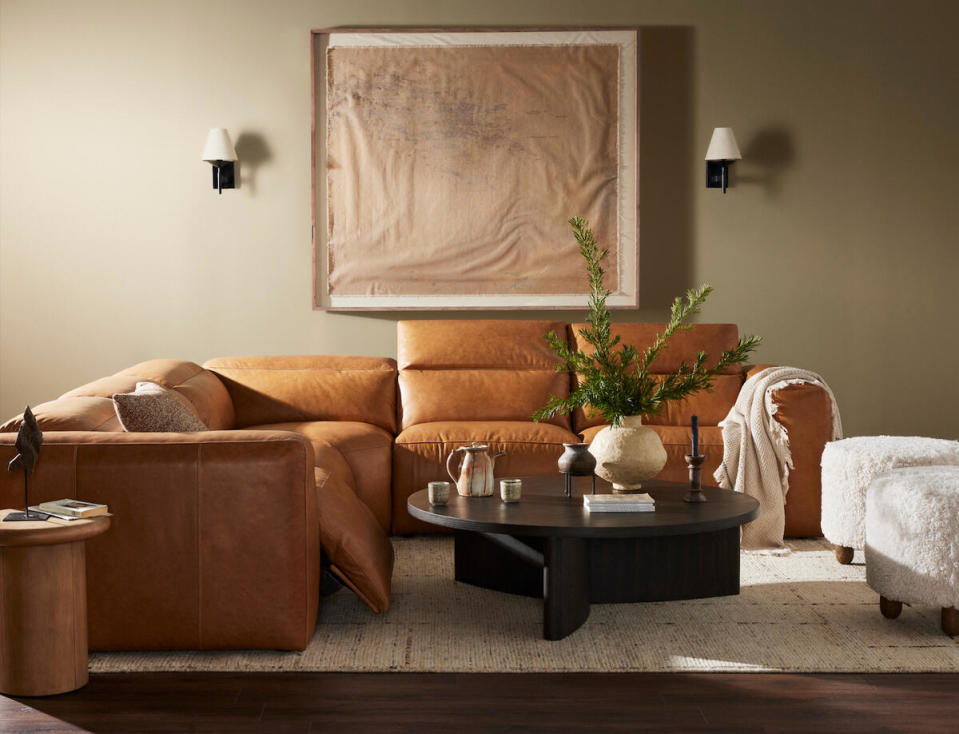 Four Hands offers a modern interpretation of the traditional recliner in such styles as Radley, shown here as a five-piece sectional upholstered in top-grain leather
