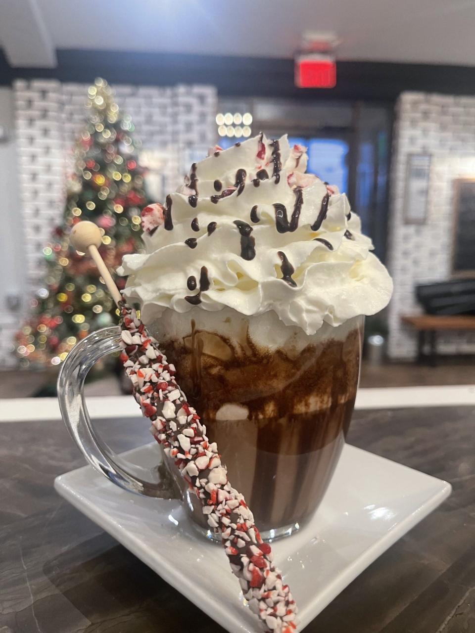 Peppermint hot chocolate (infused with peppermint, Hershey's chocolate syrup, whipped cream and crushed candy cane) from Taylor Sam's in Brick.