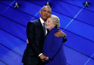 <p>President Barack Obama hugs Democratic Presidential candidate Hillary Clinton after addressing the delegates during the third day session of the Democratic National Convention in Philadelphia, Wednesday, July 27, 2016. (AP Photo/Carolyn Kaster) </p>