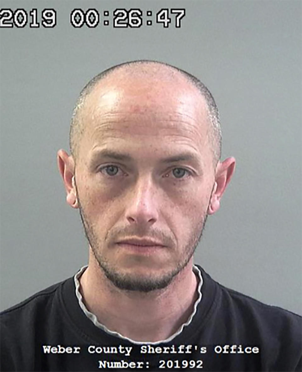 This 2019 photo provided by the Weber County Sheriff's Office shows inmate Matthew Belnap. A California man who was behind bars for bank fraud escaped from a Utah jail Tuesday night by posing as Belnap, a fellow inmate whose time had come to be released, authorities said Wednesday Feb. 26, 2020. Inmate, Kaleb Wiewandt was allowed to leave the jail in Ogden, Utah, because staff thought he was Belnap, who helped him carry out the plan, said Weber County Sheriff's Lt. Joshua Marigoni. Belnap who supposed to be freed Tuesday night after spending more than 70 days in jail after pleading no contest last year to retail theft charges, he said. ( Weber County Sheriff's Office via AP)