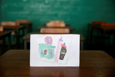 A drawing made during a lesson at a school shows what a student ate during the course of a day in Caracas, Venezuela July 14, 2016. Picture taken July 14, 2016. REUTERS/Carlos Jasso