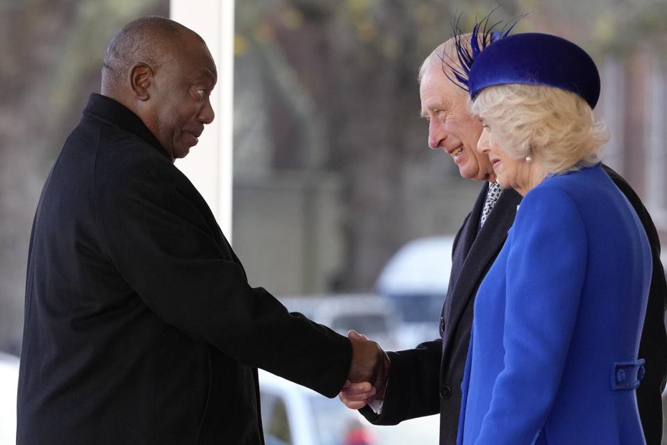 King Charles III and Camilla The Queen Consort greet the President of South Africa Cyril Ramaphosa