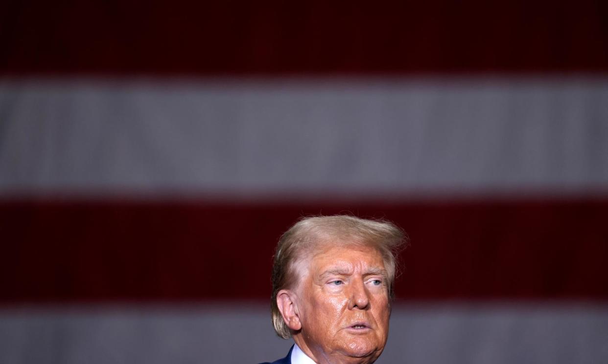 <span>Donald Trump during a campaign event in Potterville, Michigan, on 29 August.</span><span>Photograph: Jeff Kowalsky/AFP/Getty Images</span>