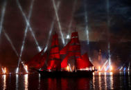 Sweden's brig Tre Kronor with scarlet sails floats on the Neva River during the Scarlet Sails festivities marking school graduation, in St. Petersburg, Russia, June 24, 2018. REUTERS/Henry Romero