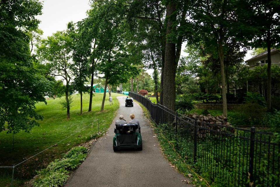 Jun 5, 2024; Columbus, Ohio, USA; Jack Nicklaus drives his wife, Barbara, back to the clubhouse after a series of morning events during a practice day for the Memorial Tournament at Muirfield Village Golf Club.