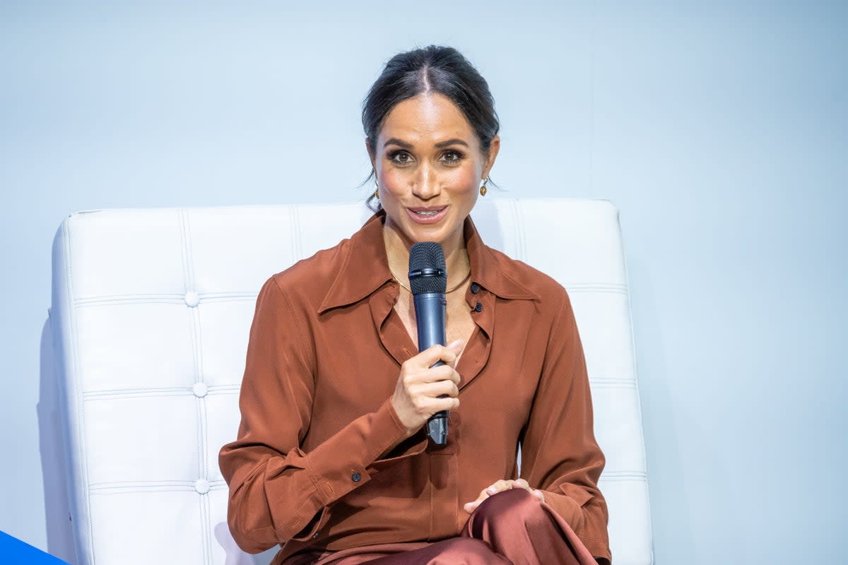 Meghan, Duchess of Sussex, speaks onstage at EAN University (Getty)