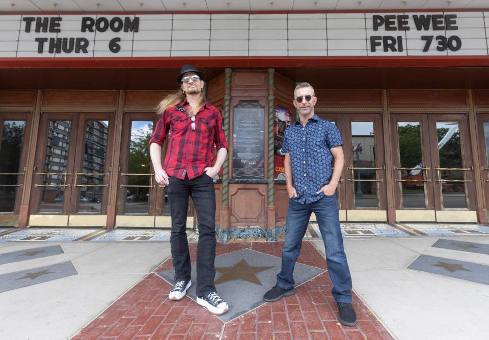 Ken Harding, left, and Jay Secrest of New Wave Station stand outside the Canton Palace Theatre, where they will perform a 25th anniversary concert on Saturday night. New Wave Nation is an '80s pop and rock tribute band. Tickets cost $25.