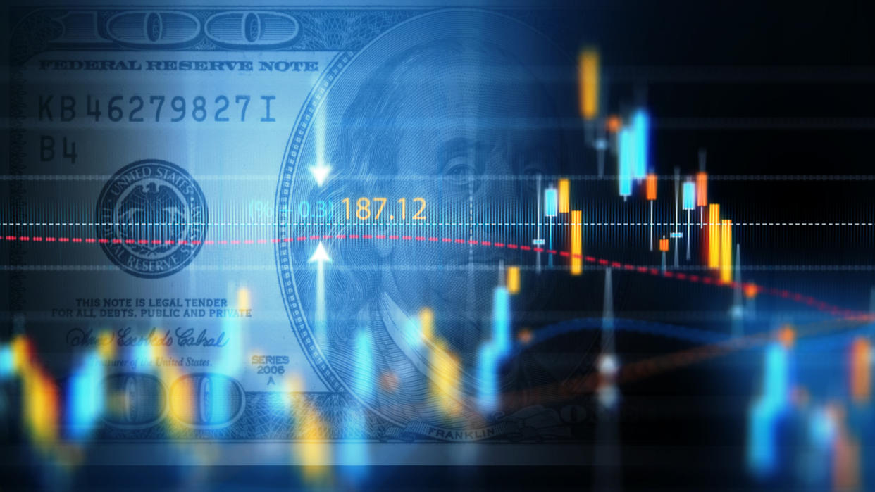 Financial data analysis graph showing market trends over one hundred American dollar bill on a digital display.