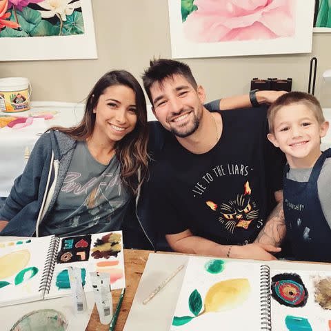 <p>Nick Castellanos Instagram</p> Jessica and Nick Castellanos with his son, Liam, in 2019.