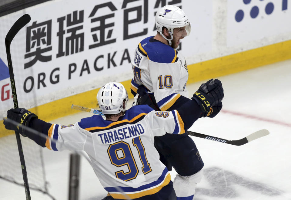 St. Louis Blues' Brayden Schenn (10) celebrates his goal against the Boston Bruins with Vladimir Tarasenko (91), of Russia, during the third period in Game 7 of the NHL hockey Stanley Cup Final, Wednesday, June 12, 2019, in Boston. (AP Photo/Charles Krupa)