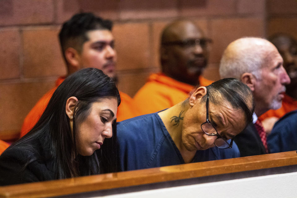 Nathan Chasing Horse, right, and California attorney Alexandra Kazarian, left, Monday, Feb. 6, 2023, in North Las Vegas, Nev. Nathan Chasing Horse appeared in court for the second time after his arrest on charges of sexual assault and human trafficking. (AP Photo/Ty O'Neil)