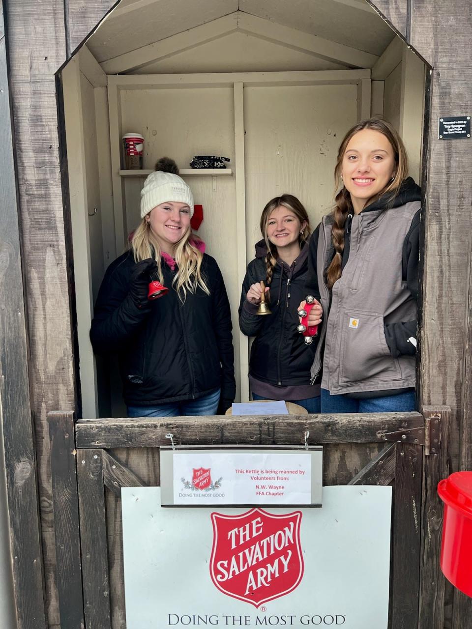 Members of the Northwestern FFA ring bells for the Salvation Army.