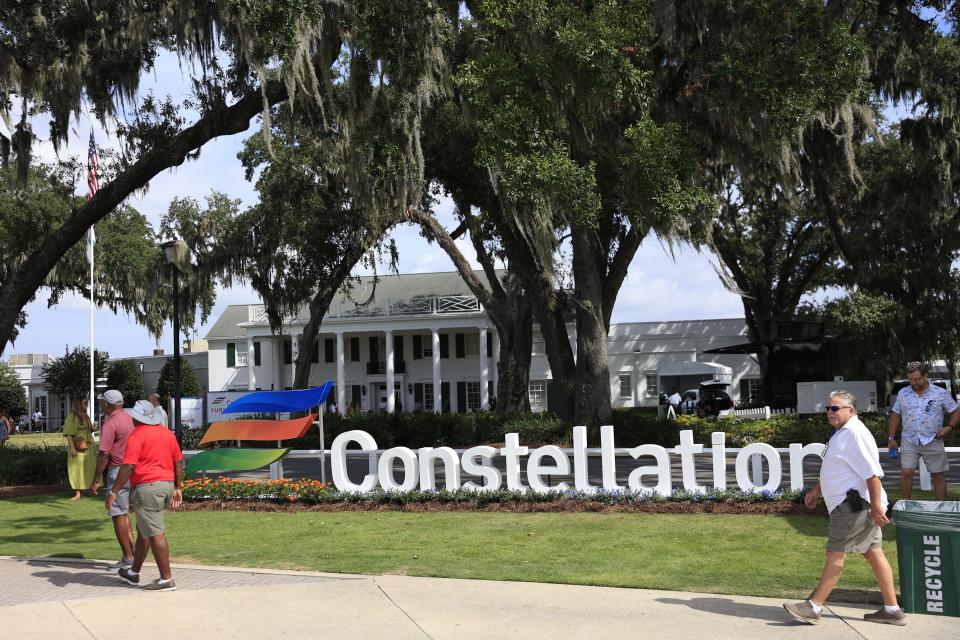 Fans walk past the Timuquana Country Club clubhouse during the second round of the 2023 Constellation Furyk & Friends tournament.