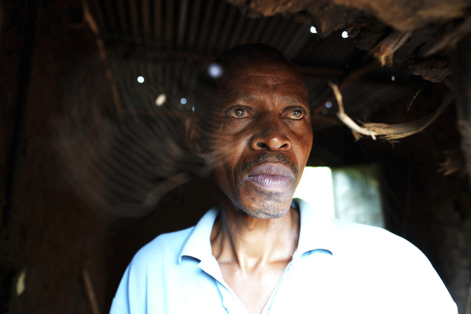 Patrick Hakizimana, a Hutu peasant who was jailed from 1996 to 2007 for his alleged role in the genocide as an army corporal, stands at his house in Gahanga the outskirts of Kigali, Rwanda Tuesday, April 4, 2024. The country will commemorate on April 7, 2024 the 30th anniversary of the genocide when ethnic Hutu extremists killed neighbors, friends and family during a three-month rampage of violence aimed at ethnic Tutsis and some moderate Hutus, leaving a death toll that Rwanda puts at 1,000,050. (AP Photo/Brian Inganga)