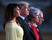 <p>British Prime Minster Theresa May and her husband Philip stand together with President Donald Trump and first lady Melania Trump at the entrance to Blenheim Palace, where they are attending a dinner with specially invited guests and business leaders, near Oxford, Britain, July 12, 2018. (Photo: Hannah McKay/Reuters) </p>