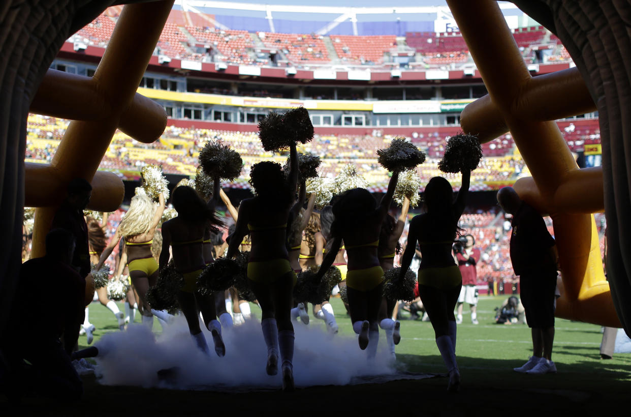 Washington is one of several NFL teams that uses alternate cheerleaders, or ambassadors, to mingle with customers or convince deep-monied fans to get luxury suites. (AP)