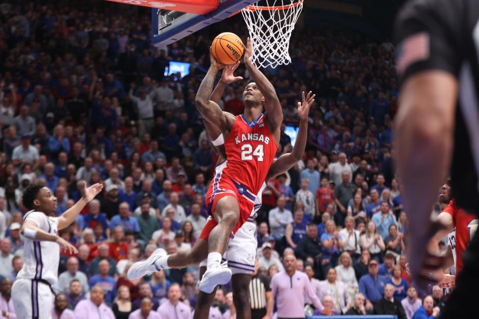 Kansas basketball forward KJ Adams Jr. (24) takes a shot against Kansas State during the first half of the Sunflower Showdown game at Allen Fieldhouse on March 5, 2024.