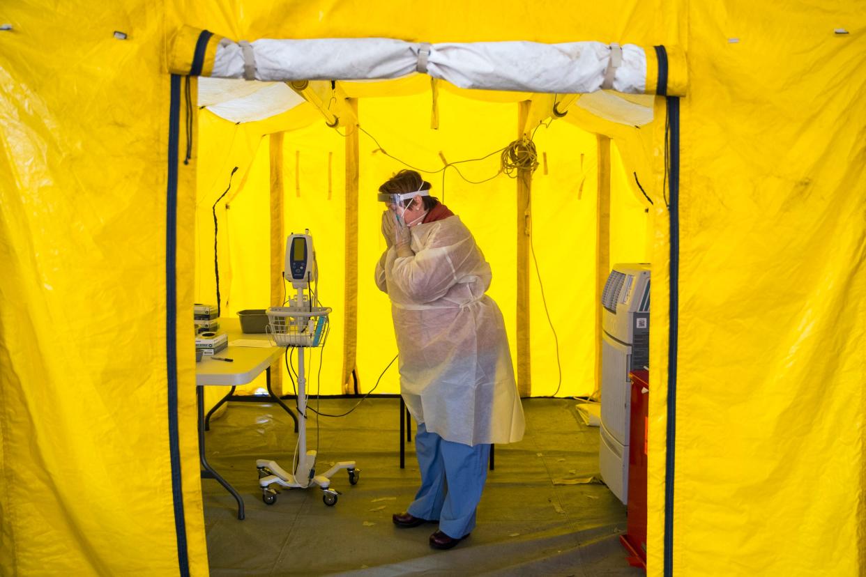 coronavirus covid 19 testing yellow tent center parking lot wellesley ospital GettyImages 1207430504