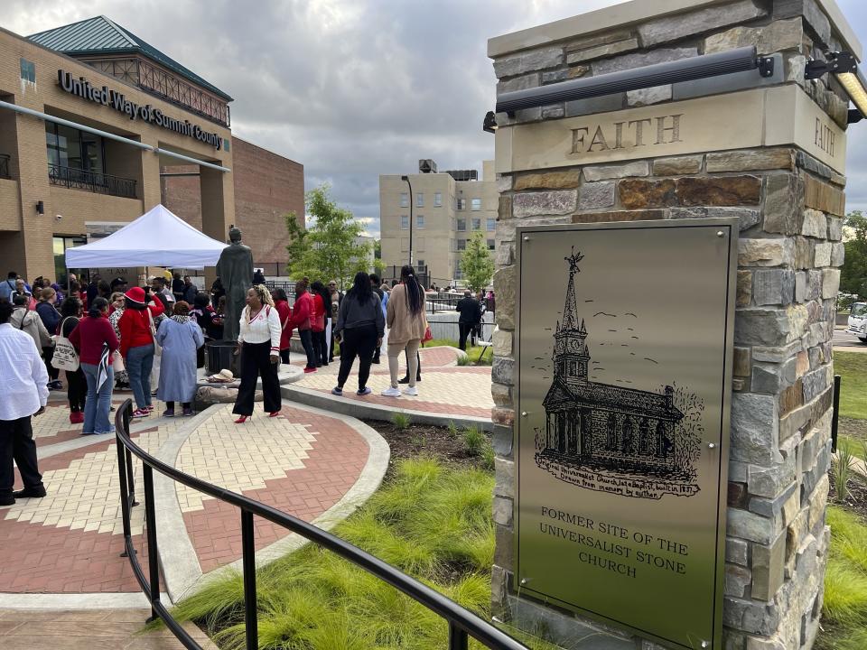 A pillar at one entrance of the Sojourner Truth Legacy Plaza depicts the Universalist Stone Church that once sat on the grounds of the United Way of Summit and Medina in Akron, Ohio on Wednesday, May 29, 2024. Hundreds gathered in an Ohio city Wednesday to unveil the plaza and statue dedicated to women's rights pioneer Sojourner Truth at the very spot she gave a speech now known as "Ain't I a Woman?" 173 years earlier. (AP Photo/Patrick Orsagos)