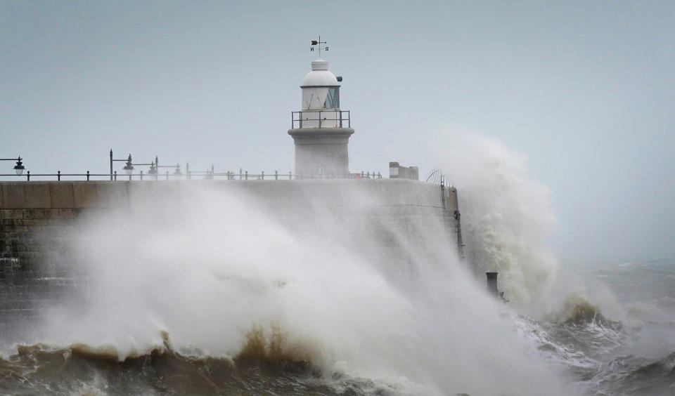 Waves crash against the harbour wall during strong winds in Folkestone, Kent. Picture date: Friday March 31, 2023. (Photo by Gareth Fuller/PA Images via Getty Images)