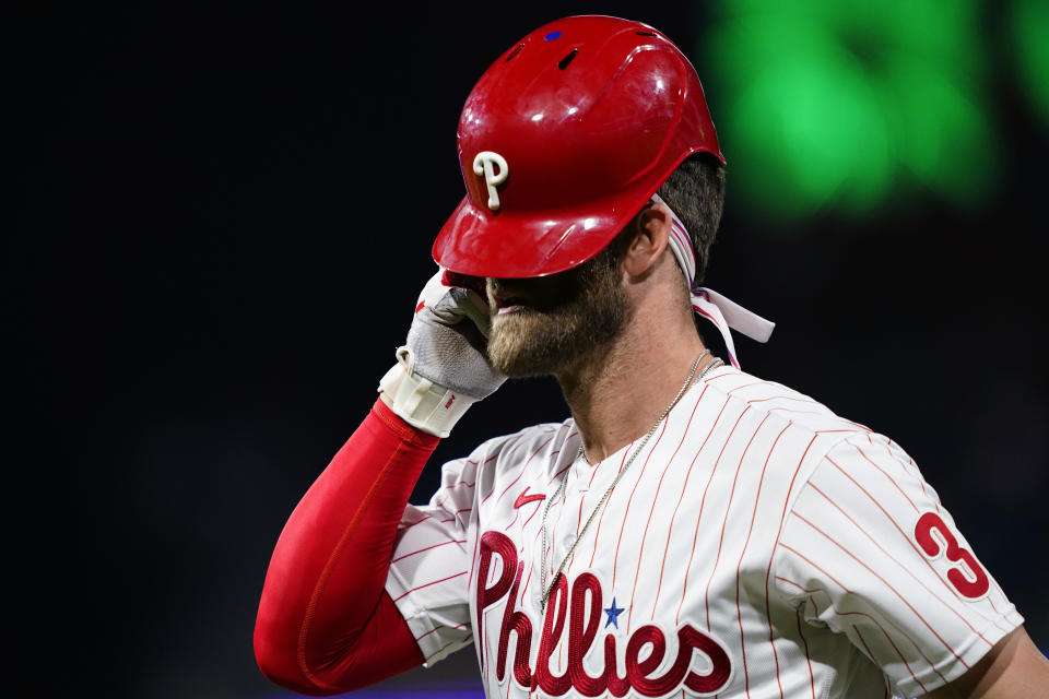 Philadelphia Phillies' Bryce Harper reacts after grounding out against San Francisco Giants pitcher Tyler Rogers during the seventh inning of a baseball game, Tuesday, May 31, 2022, in Philadelphia. (AP Photo/Matt Slocum)