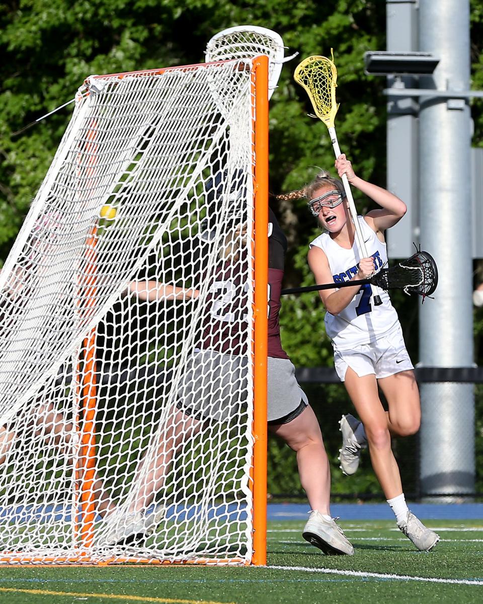 Scituate's Charlotte Spaulding scores a goal to give Scituate the 16-12 lead over Falmouth during second half action of their game against Falmouth in the Round of 32 of the Division 2 state tournament at Scituate High School on Tuesday, June 7, 2022. 