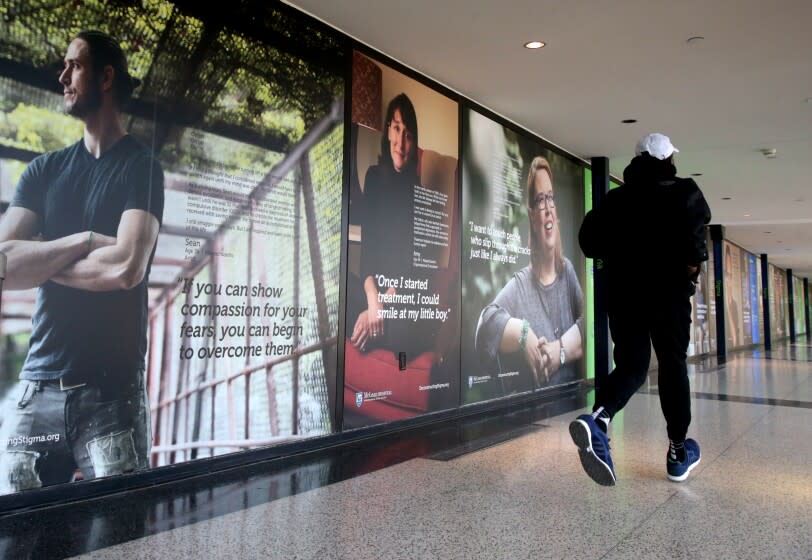 A photo exhibit looking at mental health issues is pictured at Logan Airport in Boston on Dec. 2, 2016.