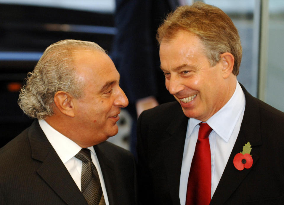 British Prime Minister Tony Blair (right) talks to Arcadia boss Sir Philip Green during a visit for the official opening of the Fashion Retail Academy in central London. PRESS ASSOCIATION Photo. Picture date: Tuesday October 31 2006. Sir Philip Green today offered Tony Blair a job when his premiership ends - in the fashion industry.The Arcadia boss made the proposition as the Prime Minister attended the opening of the Fashion Retail Academy's new buildings in central London. See PA story POLITICS Blair. Photo credit should read: Fiona Hanson/WPA rota/PA.