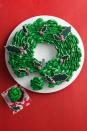 <p>This pretty-as-a-picture dessert uses lots of individual treats, like cupcakes and cut-out cookies, to create one temptingly sweet holiday masterpiece.</p><p><a href="https://www.womansday.com/food-recipes/food-drinks/recipes/a14732/cupcake-wreath-recipe-wdy1213/" rel="nofollow noopener" target="_blank" data-ylk="slk:Get the recipe.;elm:context_link;itc:0;sec:content-canvas" class="link "><em>Get the recipe.</em></a></p>