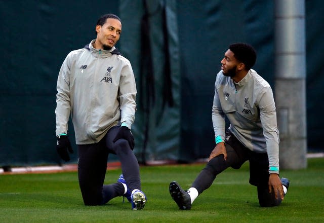 Liverpool’s Virgil van Dijk (left) and Joe Gomez both returned to action after injury 